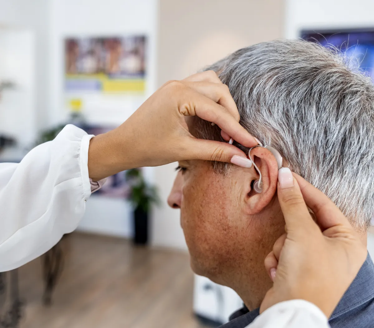 HASSA fitting of hearing aid on male client