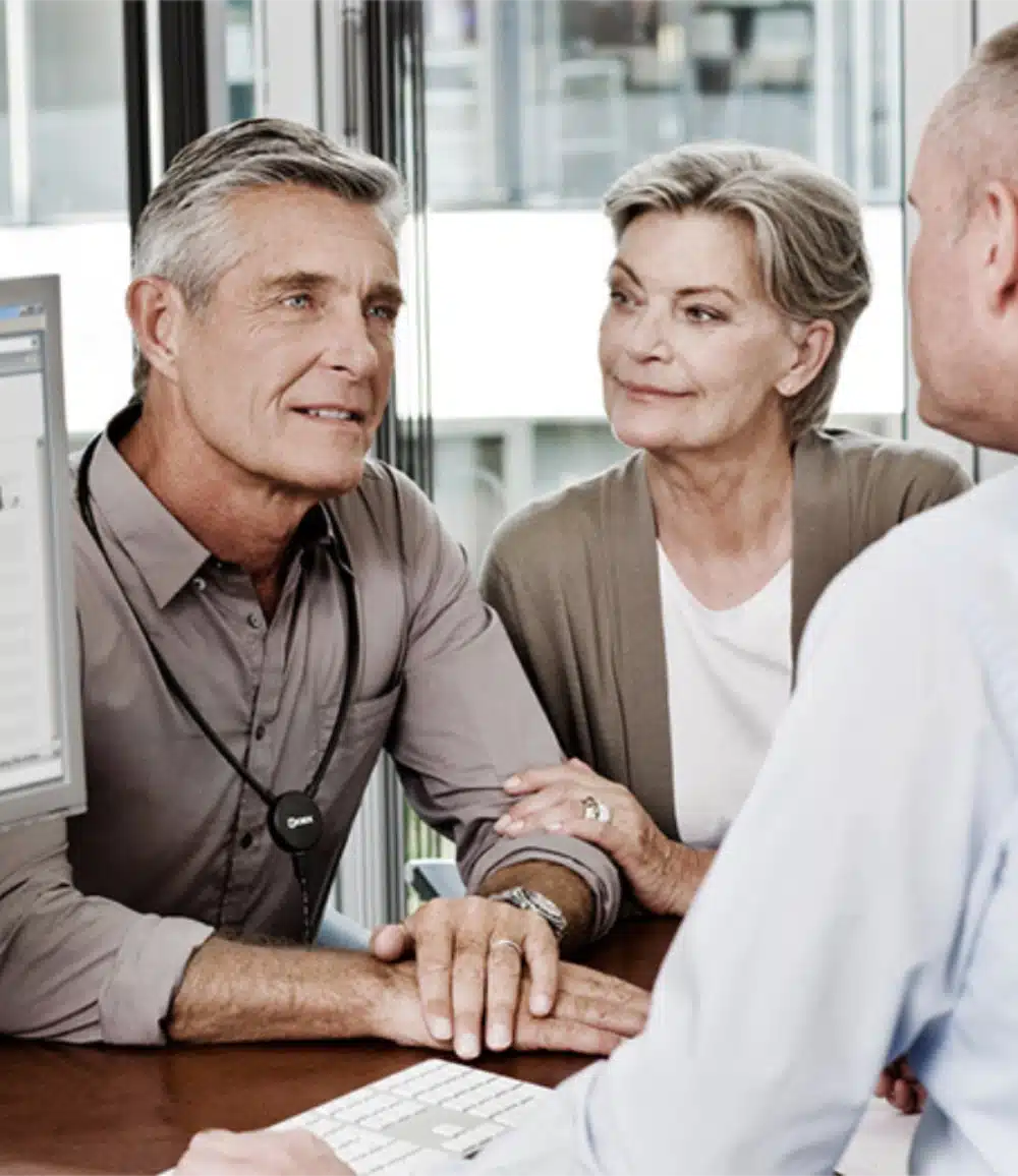 HASSA couple talking to audiologist