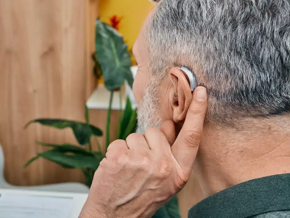 Man Adjusts to his New Hearing Aids A Step-by-Step Guide